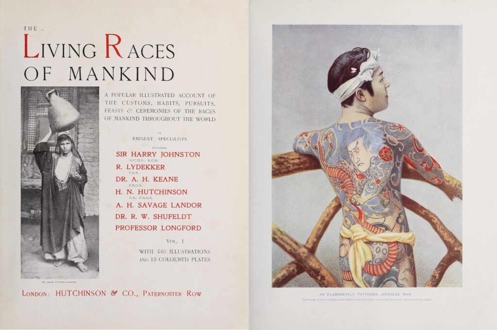 Two pages of the cover image and the front matter of The Living Races of Mankind, a book published in 1902 in London. The first page on the left includes a book description, which reads, “A popular illustrated account of the customs, habits, pursuits, feasts & ceremonies of the races of mankind throughout the world.” To the left, there is a picture of an Arab person carrying a water jug on top of his head. On the second page on the right is a picture of a Japanese man’s back, covered in red and blue tattoos. The caption for this image reads, “An elaborately tattooed Japanese man. Tattooing of this complex and highly-coloured type was at one time not uncommon in Japan.”