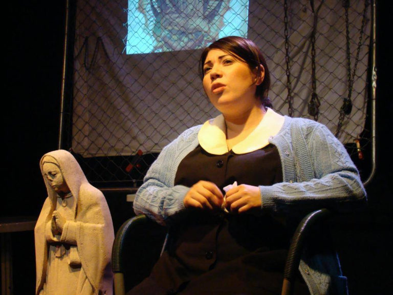 April Ibarra performs the monologue "virgencita linda" in the Breath of Fire Latina Theater Ensemble production of 14 (March 2008). Photo credit: Karyn Lawrence.