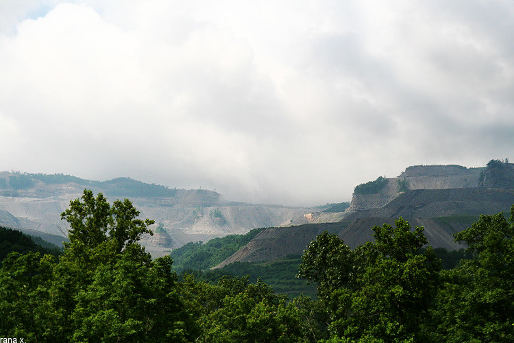 Color photo of a landscape of coal mine blasted mountains in Kentucky