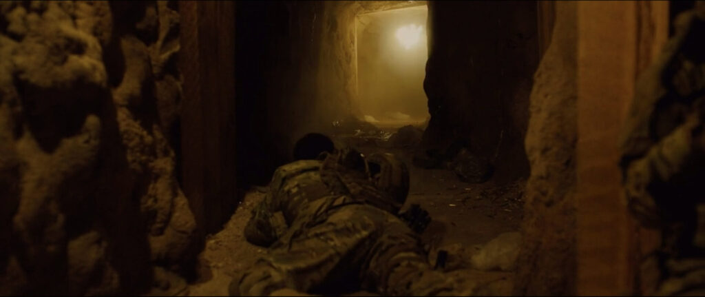 Scene from Sicario. Explosion at the far end of the tunnel.
