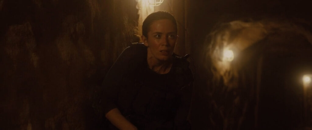 Scene from Sicario. Kate making her way through the tunnel.