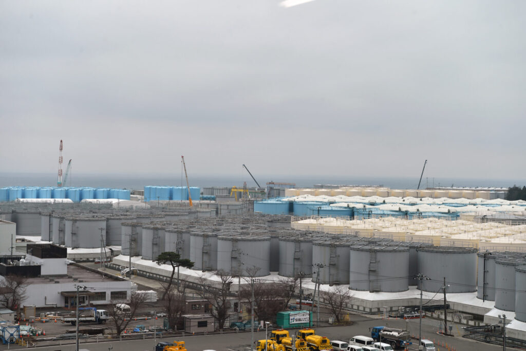 Photo of rows of cylindrical nuclear wastewater containers at TEPCO’s Fukushima Daiichi Nuclear Power Plant in Japan.