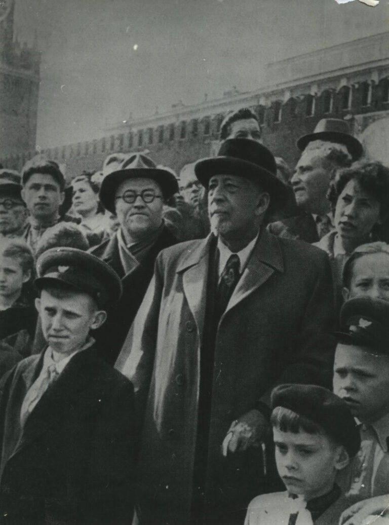 W. E. B. Du Bois standing in a crowd, possibly in Berlin (1958).