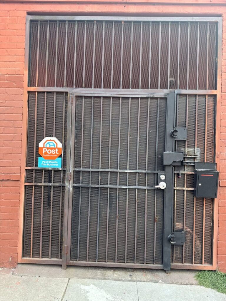 The screened-in entry to the Teds Budz warehouse, where workers take smoke breaks (author’s photo). Is around the corner from the block where the zombie dance scenes in Michael Jackson’s Thriller video was shot. 