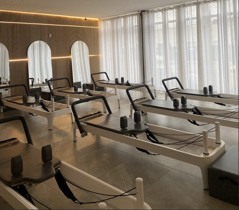 Photo of pilates machines in a studio