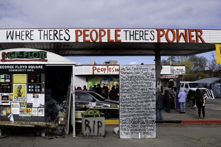 This image shows people gathered at George Floyd Square in Minneapolis, Minnesota.